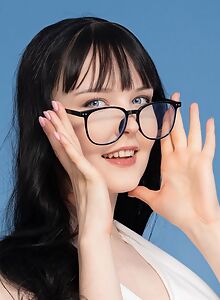 Black-haired nerdy girl spreads her ass and pussy