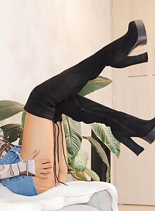 Shaved Latina spreading naked on the couch