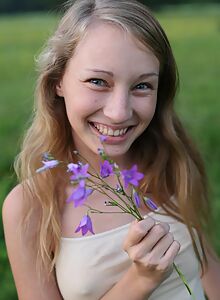 Cute blonde with an amazing ass climbing a tree