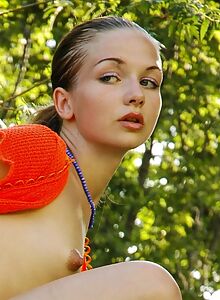 Cute girl with puffy nipples naked outdoors