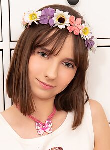 Cute shaved brunette pulls her panties aside