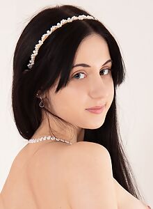 Cute brunette with firm tits in stockings