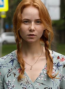 Freckled redhead goddess flashing her ass in a park