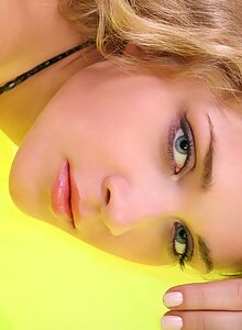 Shaved blonde girl lifts up her dress