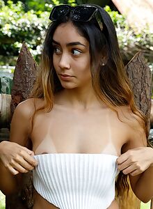 Sexy Latina flashing her great tits in public