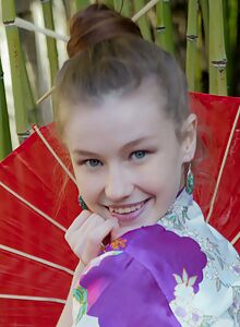 Cute teen Emily Bloom in a geisha uniform