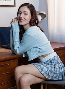 Brunette with small nipples lifts up her plaid skirt