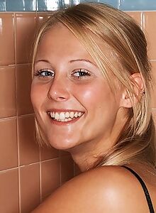 Sexy blonde teen in her bathtub