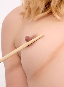 Blue-eyed blonde girl plays with her big nipples