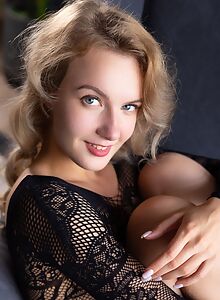Flat-chested blonde takes off her lingerie