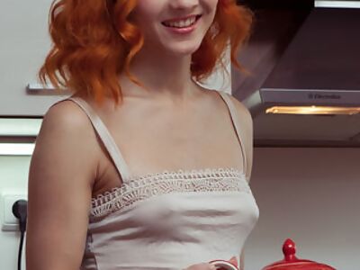 Redhead shows off her huge pussy lips