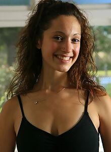 Brunette ballerina toying her trimmed pussy
