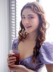 Cute girl lifts up her dress and spreads her asshole