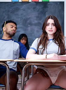 Three naughty coeds share one cock in the classroom