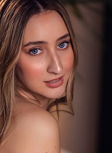 Blonde with blue eyes spreads her holes on the couch