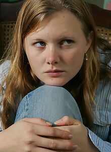 Blonde amateur spreads her hairy pussy on a chair