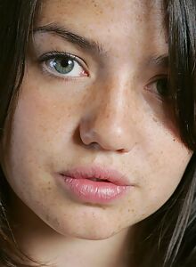 Cute freckled brunette strips and spreads