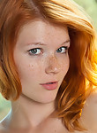 Perfect freckled redhead posing nude