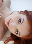 Gorgeous redhead nude in the bathtub