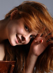 Cute redhead teen posing naked