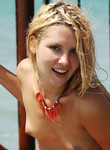 Sexy blonde teen naked in the sea