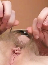Blonde with pale skin plays with her hairy pussy
