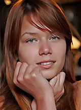 Redhead teen posing nude