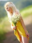 Blonde teen in a yellow dress