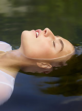 Amazingly beautiful model Cleo posing in pool in nude art