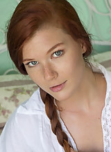 Sexy redhead Mia Sollis spreading in bed