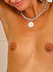 Skinny blonde teen with pierced nipples stripping