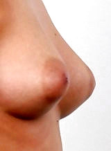Casting pics of a shaved blonde with large areolas