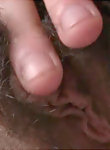 Brunette almost fisting her hairy pussy