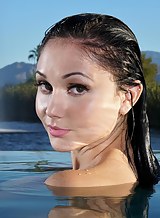 Brunette babe Ariana Marie gapes her wet pink pussy by the pool