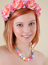 Cute redhead teen with blue eyes posing nude