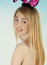 Flat-chested blonde teen dressed as a bunny